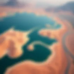 Aerial view of Lake Qudra showcasing its expansive waters amidst the Dubai desert landscape.